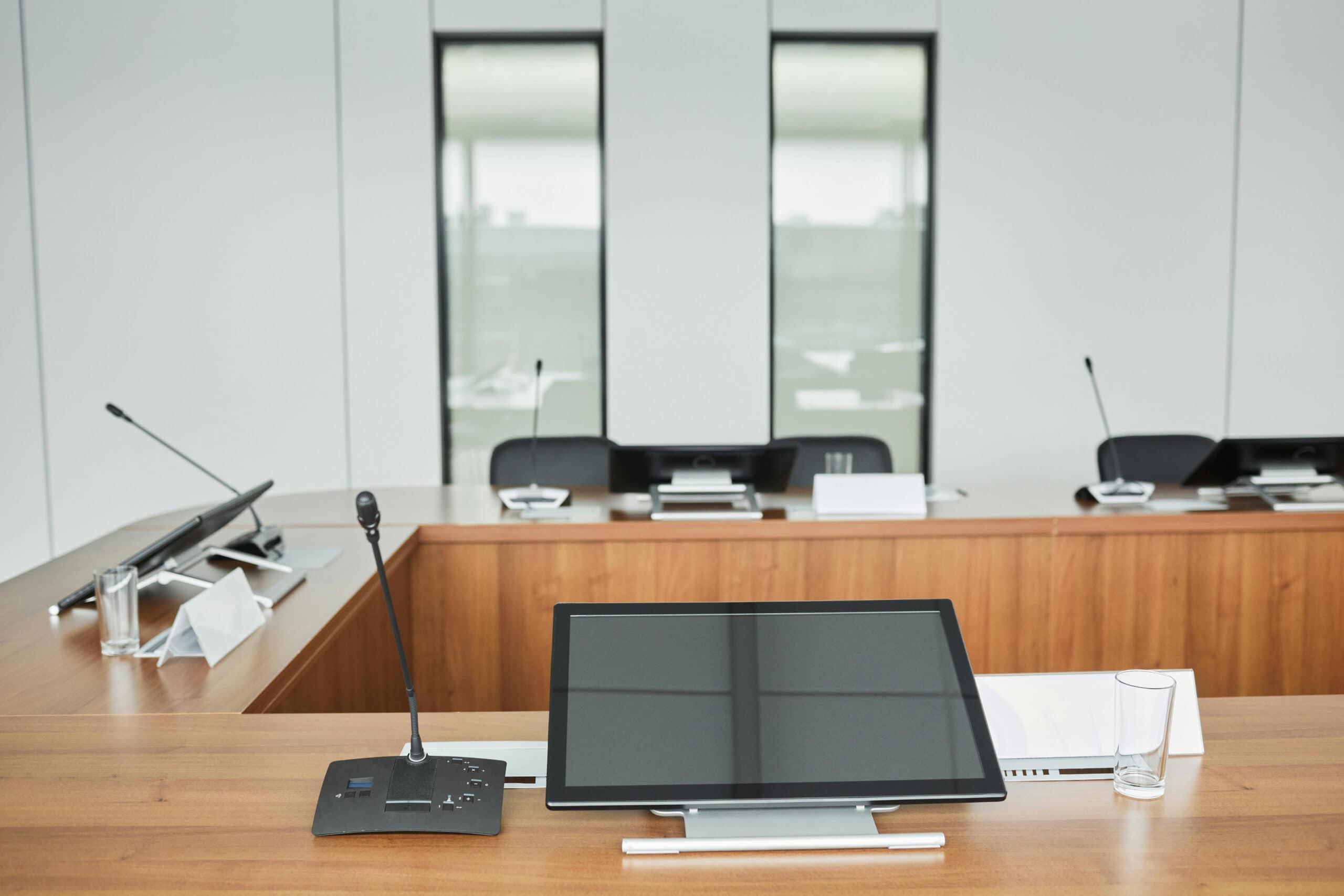 AV integration company project with conference room microphones, display, and meeting technology