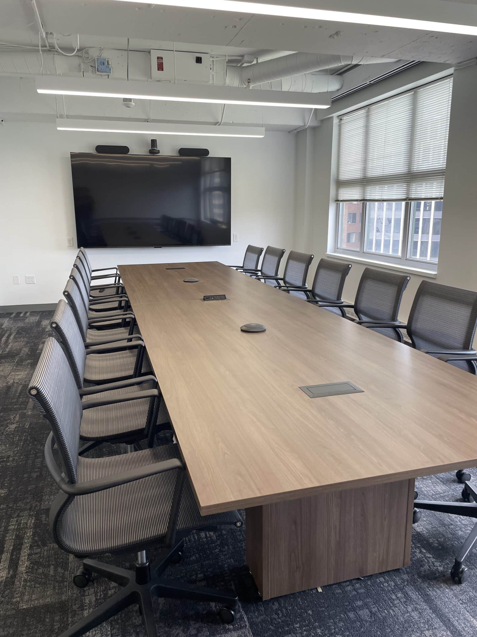 AV installation services for a boardroom table with conferencing microphone