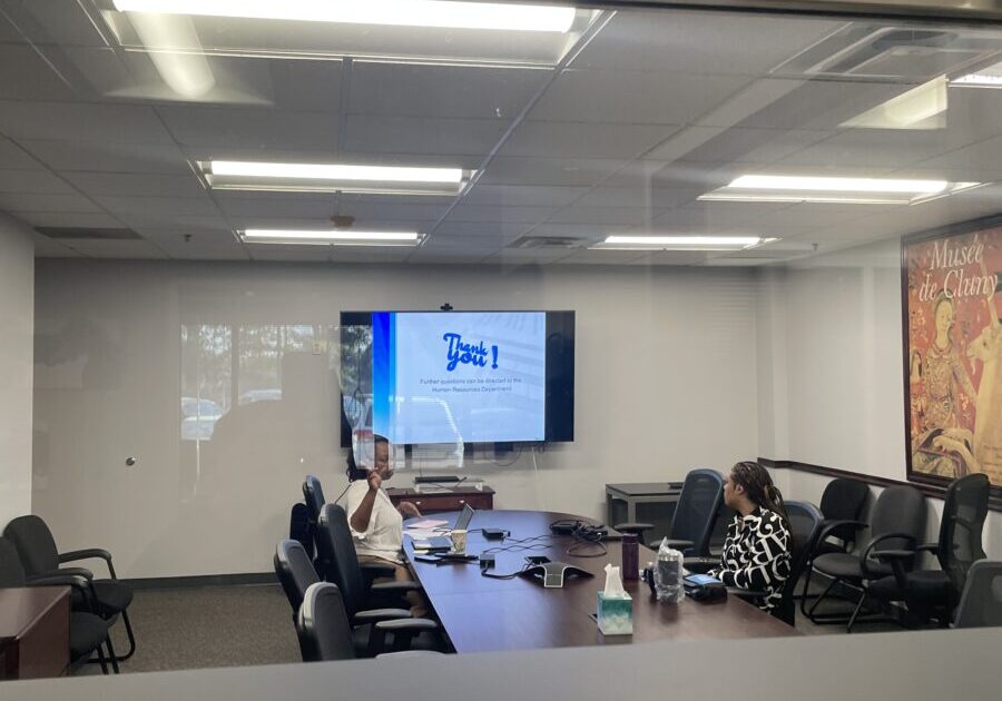 AV installation services with presentation screen for a meeting room